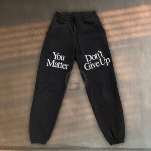 Praying Don't Give Up Sweats Washed Black don’t give up you matter sweatpants